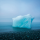 “The End Is Near.” Ice that broke off the Vatnajokull Glacier at Jokulsarlon Bay in Iceland.